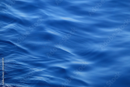 Bright blue sea surface, close-up.