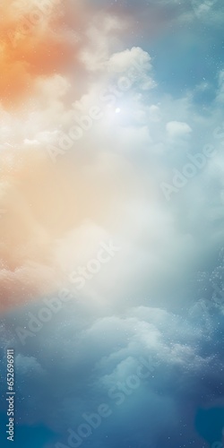 Blurred out clouds abstract nature background with lots of bokeh and a bright center spotlight and a subtle vignette border. © W&S Stock