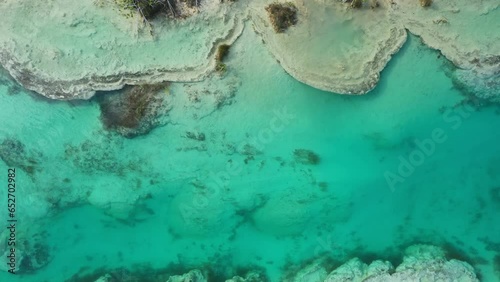 Overhead view of shallow turquoise water at Bacalar river, Yukatan, Mexico photo