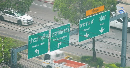 Thai Road Signage Directions at Huai Khwang District from an Above Angle Perspective in Bangkok, Thailand in 4K DCI. photo