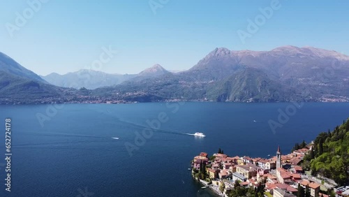 flight over lake Como, varena town and mountains on the lake