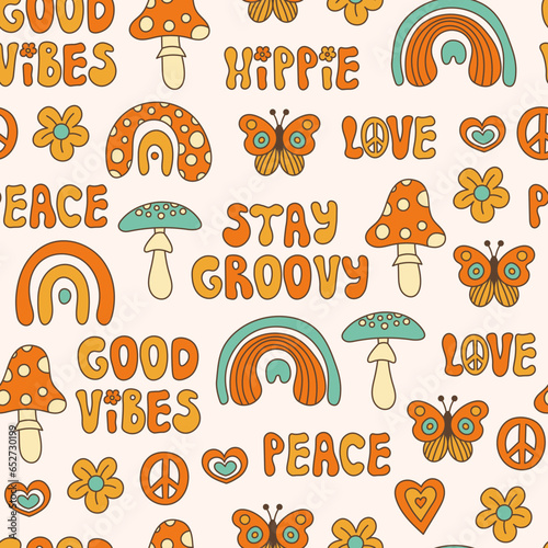Groovy seamless pattern 60s style. Trendy retro seamless background with hippie symbols, mushroom, rainbow, handwritten lettering, flowers, hearts. Repeat vector illustration