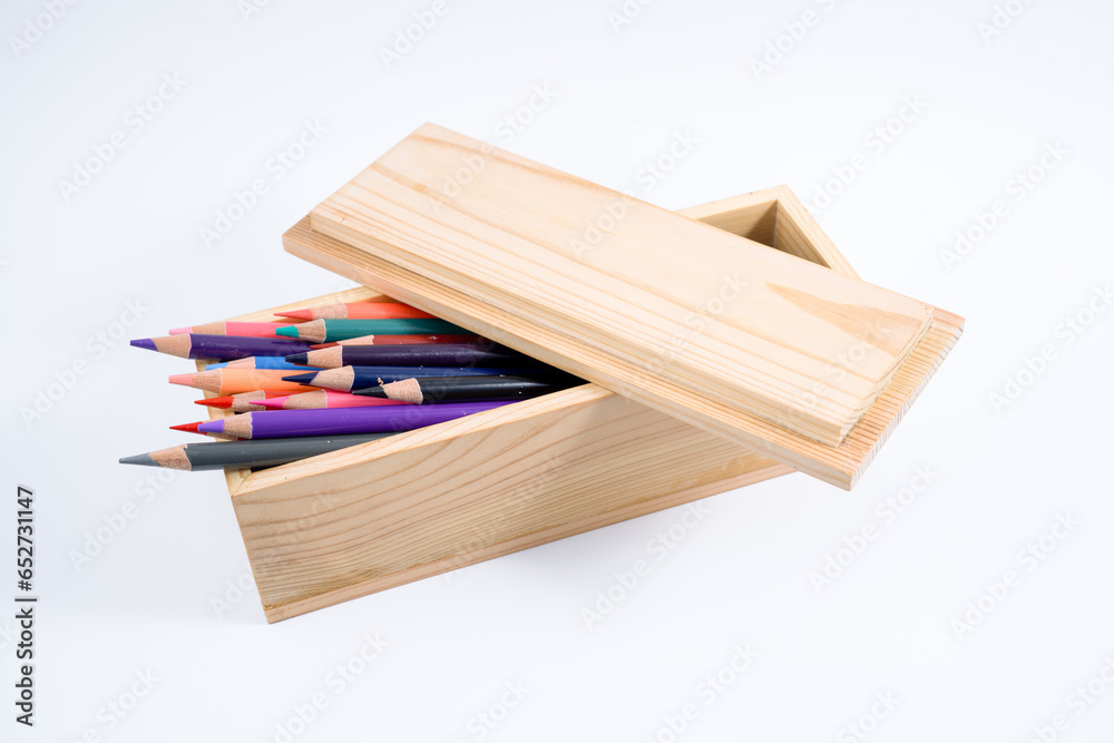 Hand Made bespoke pen pencil case made out of scrap wood with loose fit lid isolated on a white background Hand Made bespoke pen pencil case made out of scrap wood with loose fit lid isolated on a white background