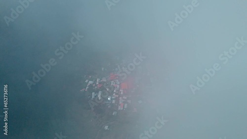 Aerial drone shot from the clouds revealing the picturesque village of Tapay in the Colca Valley. Breathtaking high-altitude perspective capturing the charm of this Andean village. photo