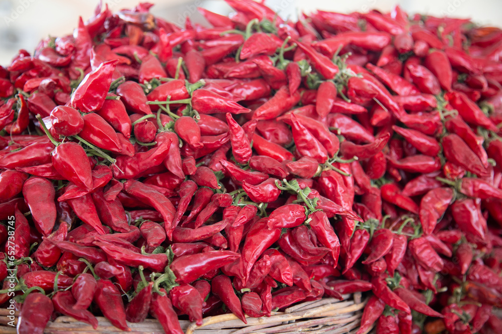 They keep very spicy red chillies in the shop for sale