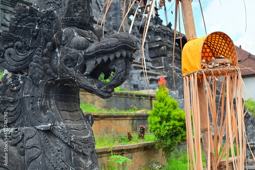 Traditional old ancient Balinese mask demon angel guarding sacred ritual temple