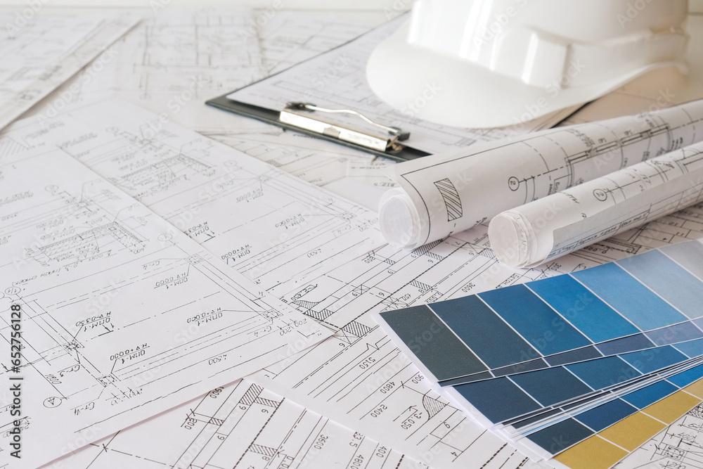 architect design working drawing sketch plans blueprints and making architectural construction model in architect studio,flat lay. architect design working drawing sketch plans blueprints and making architectural construction model in architect studio,flat lay.
