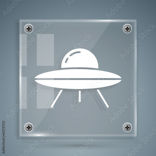 White UFO flying spaceship icon isolated on grey background. Flying saucer. Alien space ship. Futuristic unknown flying object. Square glass panels. Vector