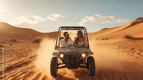 Man and woman driving in a buggy through the desert. © visoot