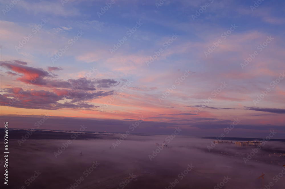 Embracing the Morning Sky: Sunrise Above Clouds