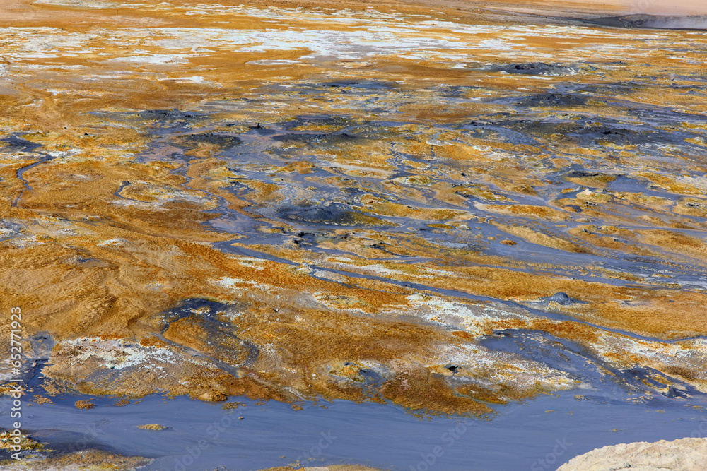 Hverir, Iceland. A surreal, bare orangy-red, geothermal area at the foot of Namafjall. Full of fumaroles, mud pools, steam vents. It's on Route 1. It is also called Namaskard Hverir. Hverir, Iceland. A surreal, bare orangy-red, geothermal area at the foot of Namafjall. Full of fumaroles, mud pools, steam vents. It's on Route 1. It is also called Namaskard Hverir.