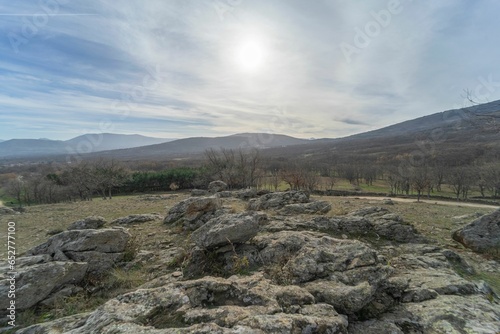 Endless landscape of earth and stones in the area of Canencia, Madrid, Spain photo