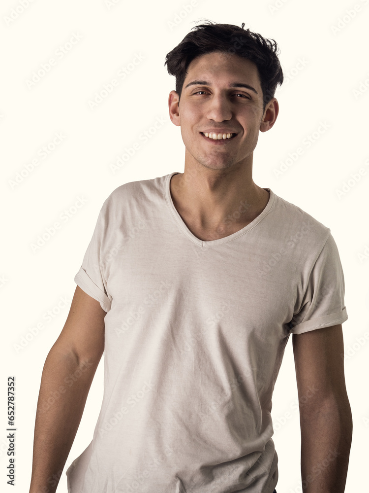 A man in a white shirt is smiling. Photo of a young and handsome man with a charming smile wearing a white shirt isolated against white background in studio shot A man in a white shirt is smiling. Photo of a young and handsome man with a charming smile wearing a white shirt isolated against white background in studio shot