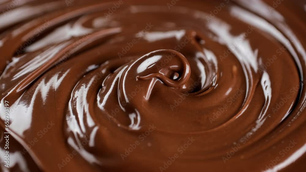 Zoom frame melted premium chocolate, rotating. Confectionery concept Zoom frame melted premium chocolate, rotating. Confectionery concept