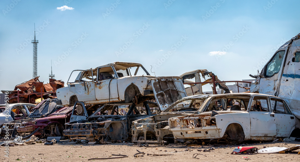damaged and looted cars in a city in Ukraine during the war