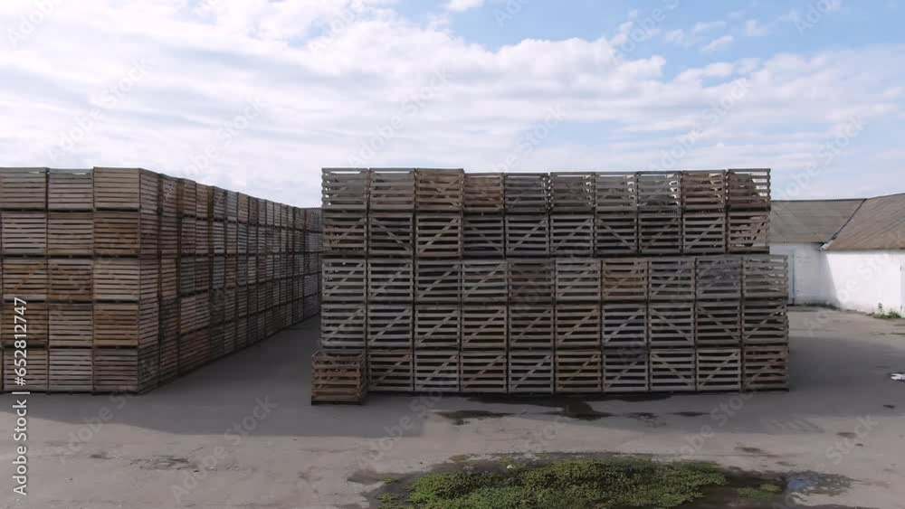 Warehouse of cushioned wooden crates for transportation.