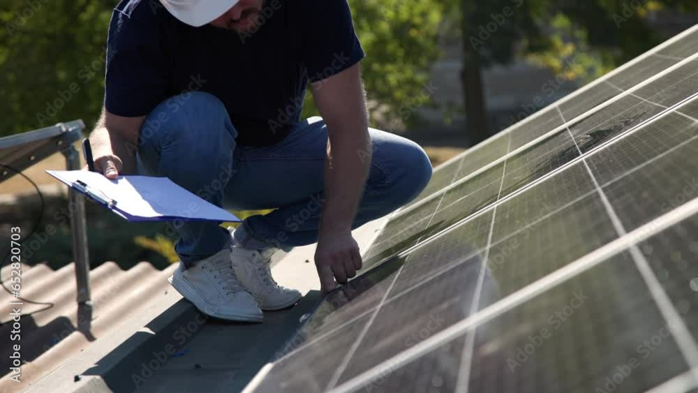 Closeup, hands and man checking solar panels, maintenance and engineer with sustainability. Male person, technician and worker with construction, completed job or inspect quality for renewable energy Closeup, hands and man checking solar panels, maintenance and engineer with sustainability. Male person, technician and worker with construction, completed job or inspect quality for renewable energy