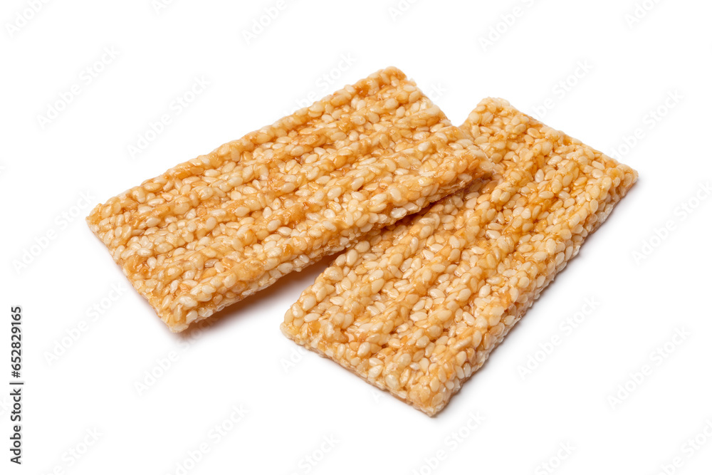 Pair of sesame snaps isolated on white background close up Pair of sesame snaps isolated on white background close up