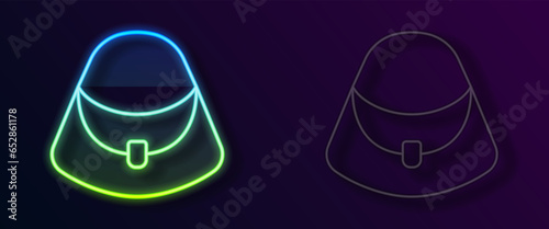 Glowing neon line Handbag icon isolated on black background. Female handbag sign. Glamour casual baggage symbol. Vector