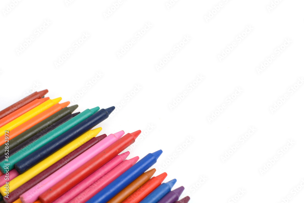 Crayons lined up isolated on white background. Crayons lined up isolated on white background.