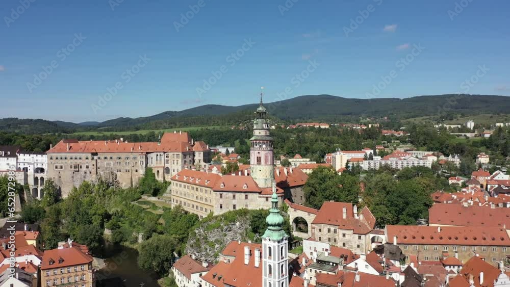 Cesky Krumlov, Czech Republic. Aerial wiew over the historical Krumlov and Vltava river. Summer. Old town. Cesky Krumlov, Czech Republic. Aerial wiew over the historical Krumlov and Vltava river. Summer. Old town.