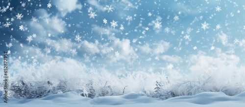 Winter background with snowflakes on a checked white backdrop © AkuAku