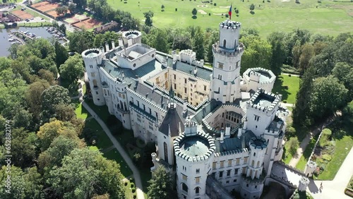 Aerial top view flight Hluboká Nad Vltavou is a Fairy tale castle in Czech Republic Europe. Summer. 
