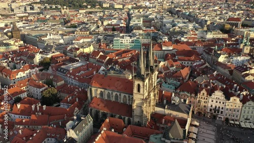 Sunny aerial drone view above Prague Old Town Square. Czech Republic. Summer. Sunset. Tourist town. City life.