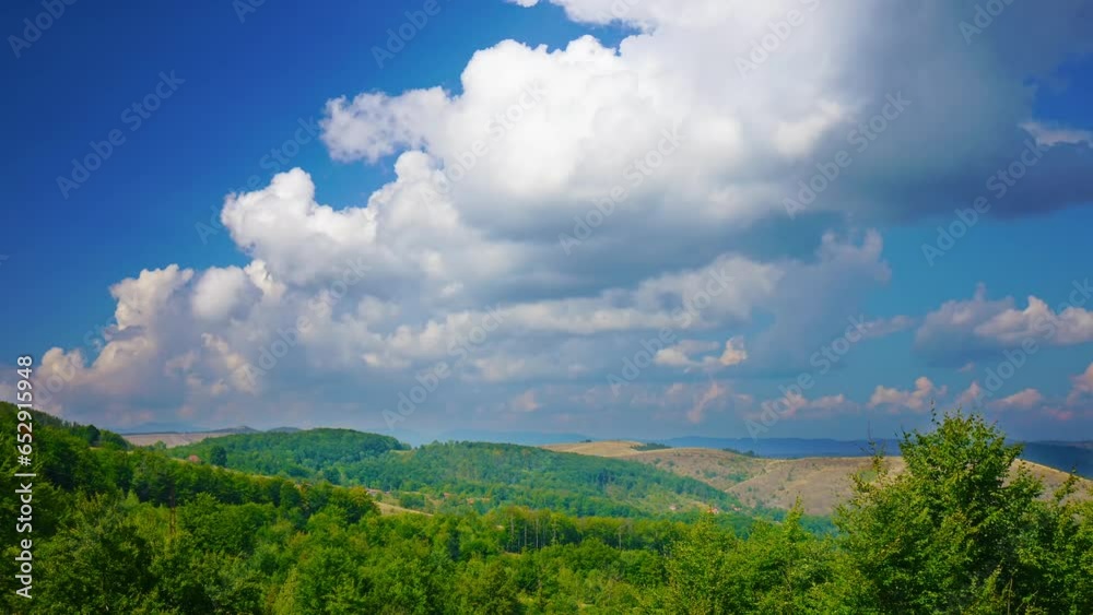 Nature landscape cumulus clouds rolling over hills and mountains time-lapse Nature landscape cumulus clouds rolling over hills and mountains time-lapse