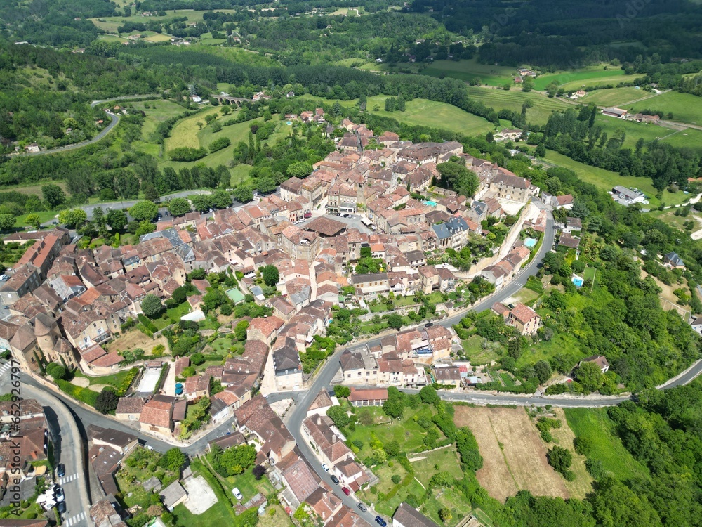 .Belves town  Dordogne France establishing aerial shot.
