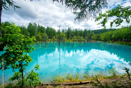 Photos Shirogane blue pond, colour is thought to result from colloidal aluminium hydrox