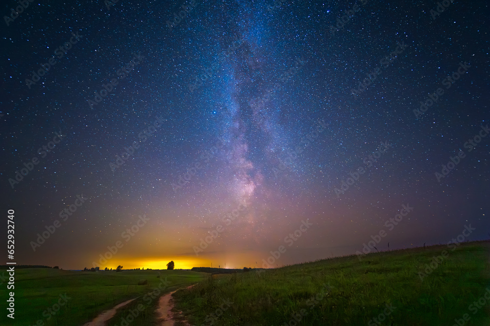 Night landscape with colorful Milky Way, autumn sky