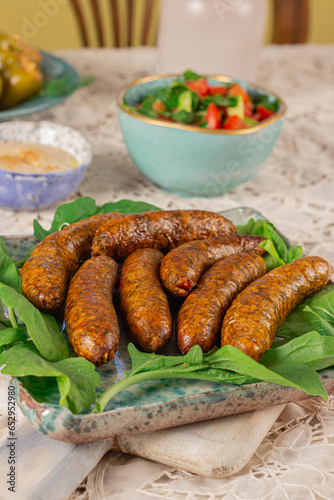 Mumbar is a type of sausage of middle eastern origin that is made with mutton, rice, black pepper, salt and cinnamon stuffed into an intestine casing - after the sausage has been cooked by boiling.  © Israa