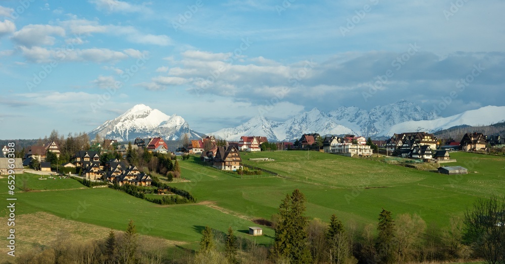 Landscape of High Tatras with luxury villas and hotels in Murzasichle village providing accommodation