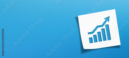фотографія Business development and growth concept with note paper on blue background