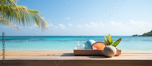 Beach display of summer products on wooden podium