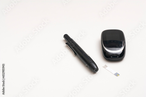 Insulin pen injector. Insulin pen fill with needle on white background. Diabetes Day.