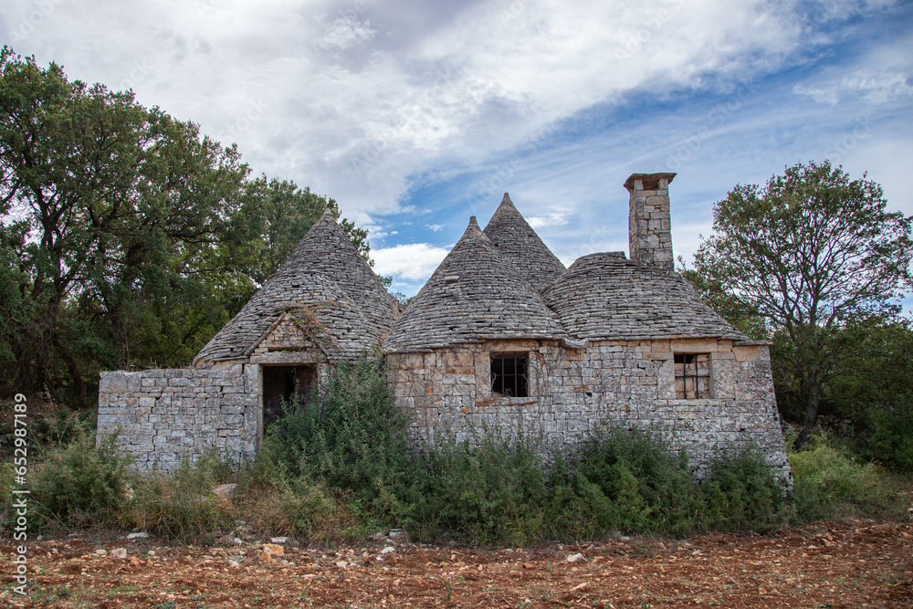 The abandoned typical trulli house in Italy The abandoned typical trulli house in Italy