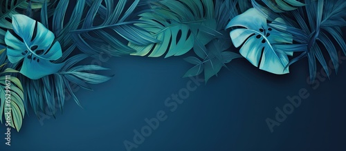 Design featuring tropical leaves on a blue background for various purposes like wallpaper photo wallpaper mural and cards photo