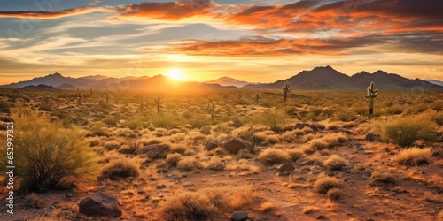 A sunrise over the desert. ...
