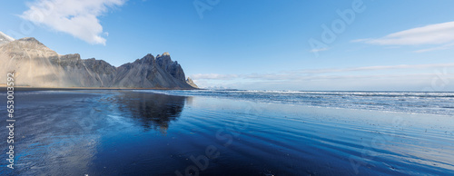 Panoramic view of stokksnes sand beach in icelandic landscape, spectacular vestrahorn mountain chain in scandinavian scenery. Spectacular iceland nature with atlantic ocean shoreline.