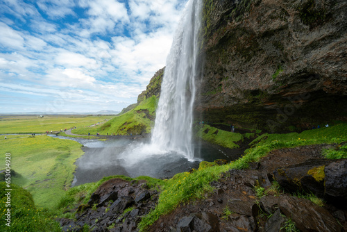 Seljalandsfoss waterfall in Iceland, approaching the back side of the falls