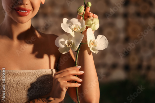 Pretty young woman with orc...