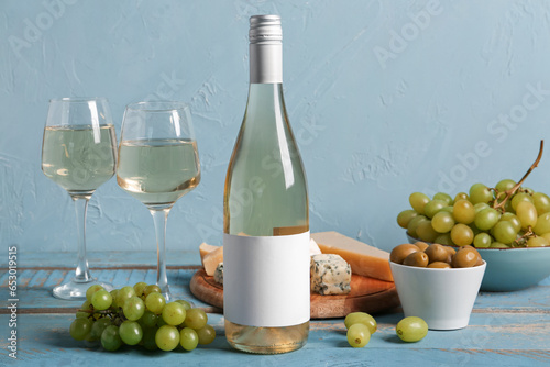Bottle and glasses of exqui...