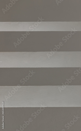 Sunlight shines through light channel of White cement wall background. Abstract interior design, Space for text, Selective Focus.