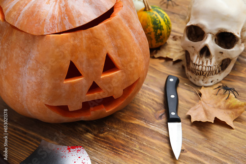 Carved pumpkin, knife and H...