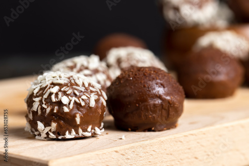 Chocolate candies with coconut flavor and filling