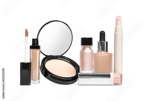 Many different makeup products isolated on white