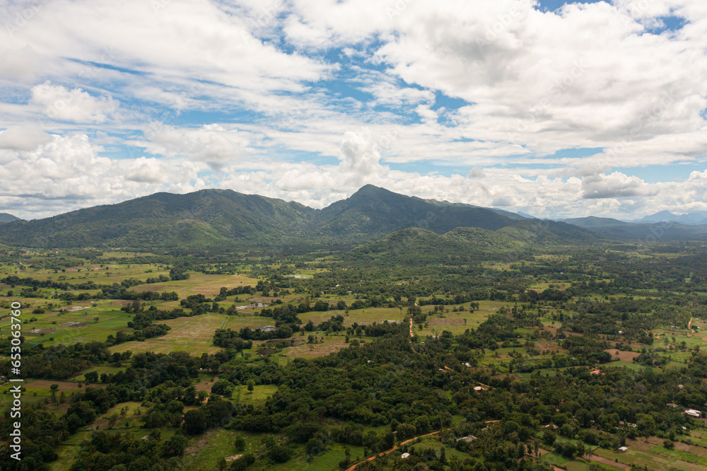 Mountains with green forests and agricultural land with farm plantations. Sri Lanka.