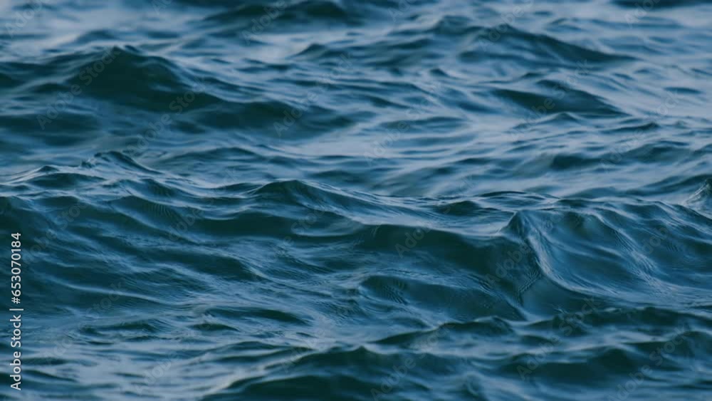 Ocean water surface. Abstract background. Slow motion. Ocean water surface. Abstract background. Slow motion.